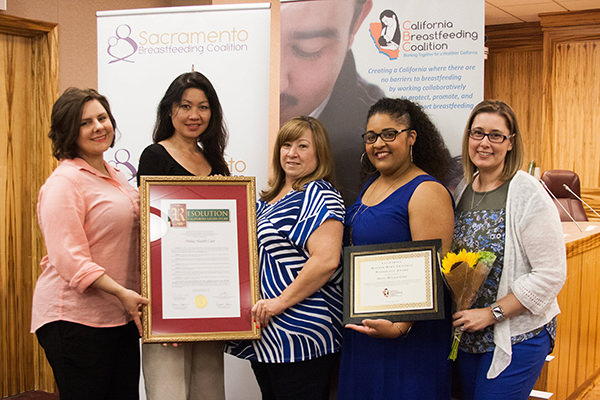 Staff receiving an award